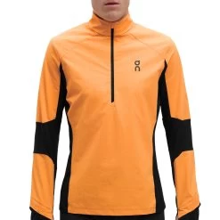 On Running On Trail Breaker Long Sleeve Running Shirt - Mango & Black 19 On Running On Trail Breaker Long Sleeve Running Shirt - Mango & Black -ON RUNNING Winkel on trail breaker long sleeve running shirt mango black 9 1278765