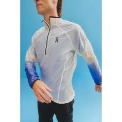 On Running On Zero Jacket Hardloopjack - Undyed-White & Cobalt 25 On Running On Zero Jacket Hardloopjack - Undyed-White & Cobalt -ON RUNNING Winkel on zero jacket undyed white cobalt 11 1443279